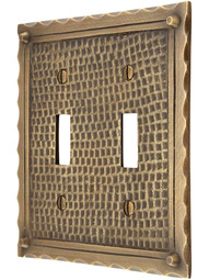 Bungalow Style Double Toggle Switch Plate In Antique Brass.